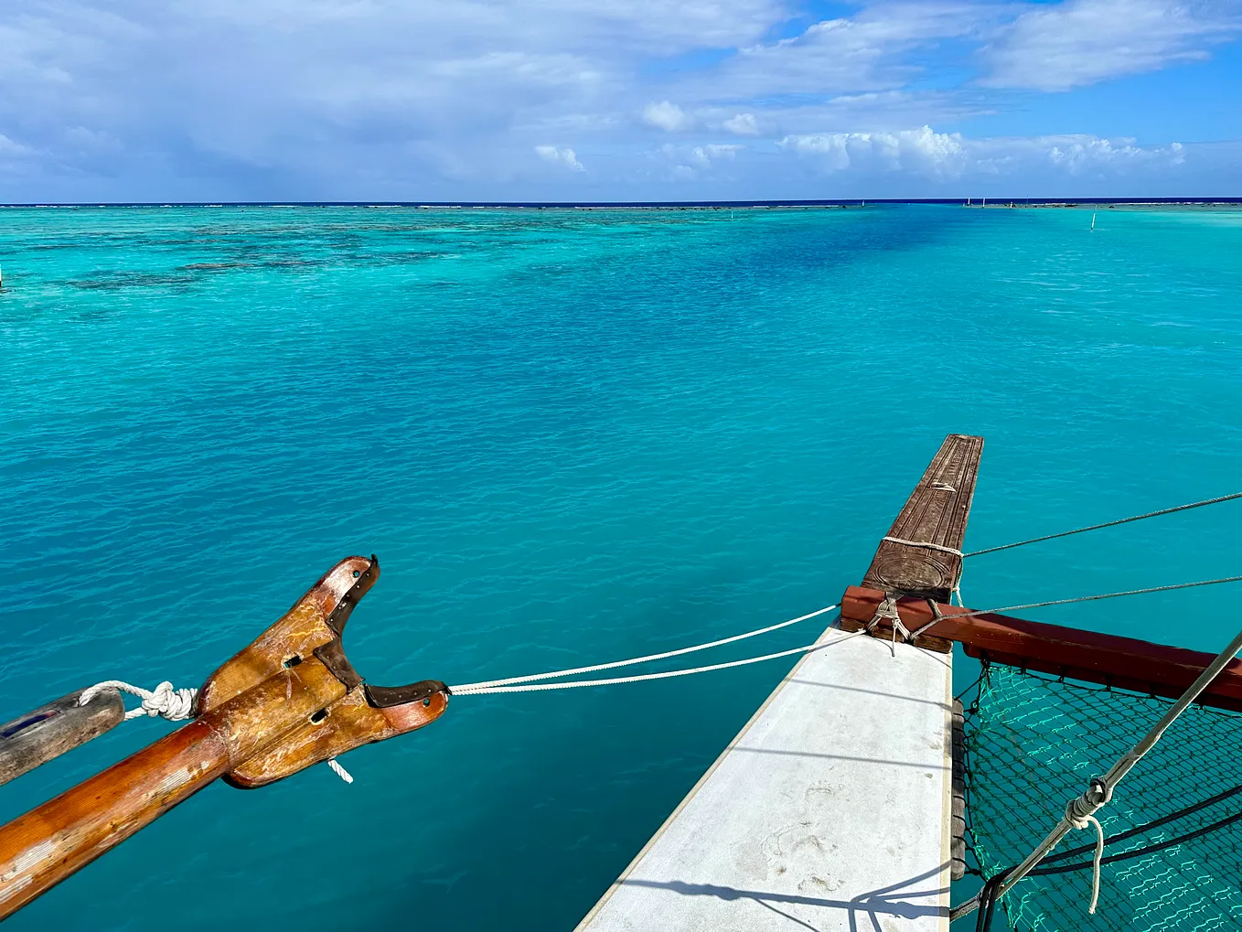 Leaving Aitutaki on the traditional vaka, Marumaru Atua. Photo © Bryce Groark, Moonjelly Foundation