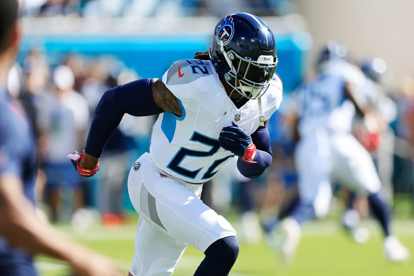 Tennessee Titans running back Derrick Henry (22) warms up before an NFL football matchup Sunday, Nov. 19, 2023 at EverBank Stadium in Jacksonville, Fla. The Jacksonville Jaguars defeated the Tennessee Titans 34–14. Credit: Corey Perrine/Florida Times-Union / USA TODAY NETWORK.