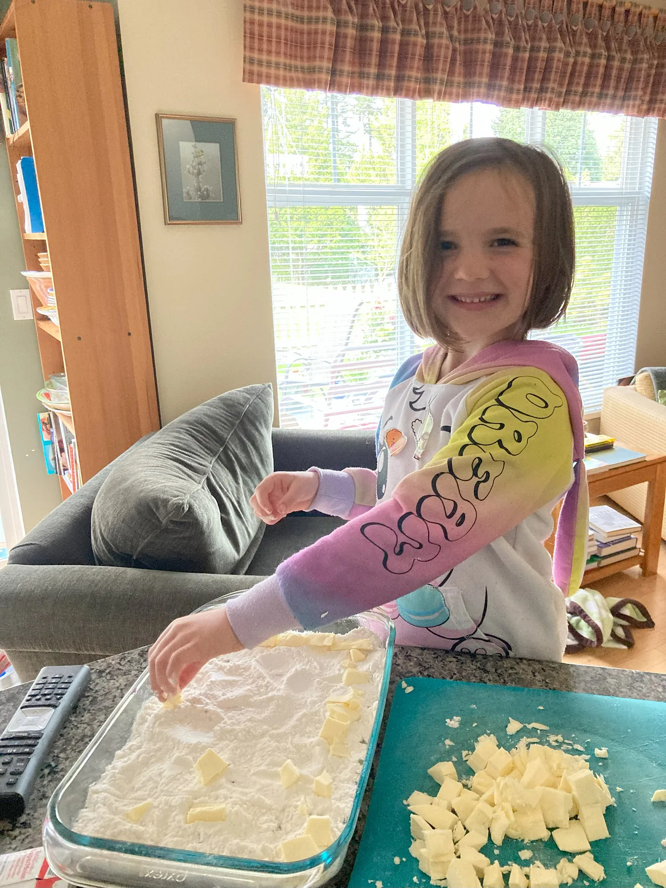 My 5 year old granddaughter is making a dump cake .