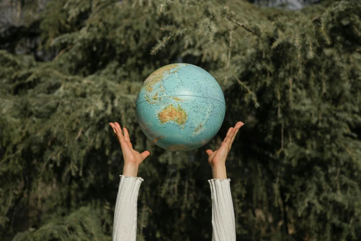 a photo of a plastic globe reflecting the vastness of the world and how important it is to respect other cultures