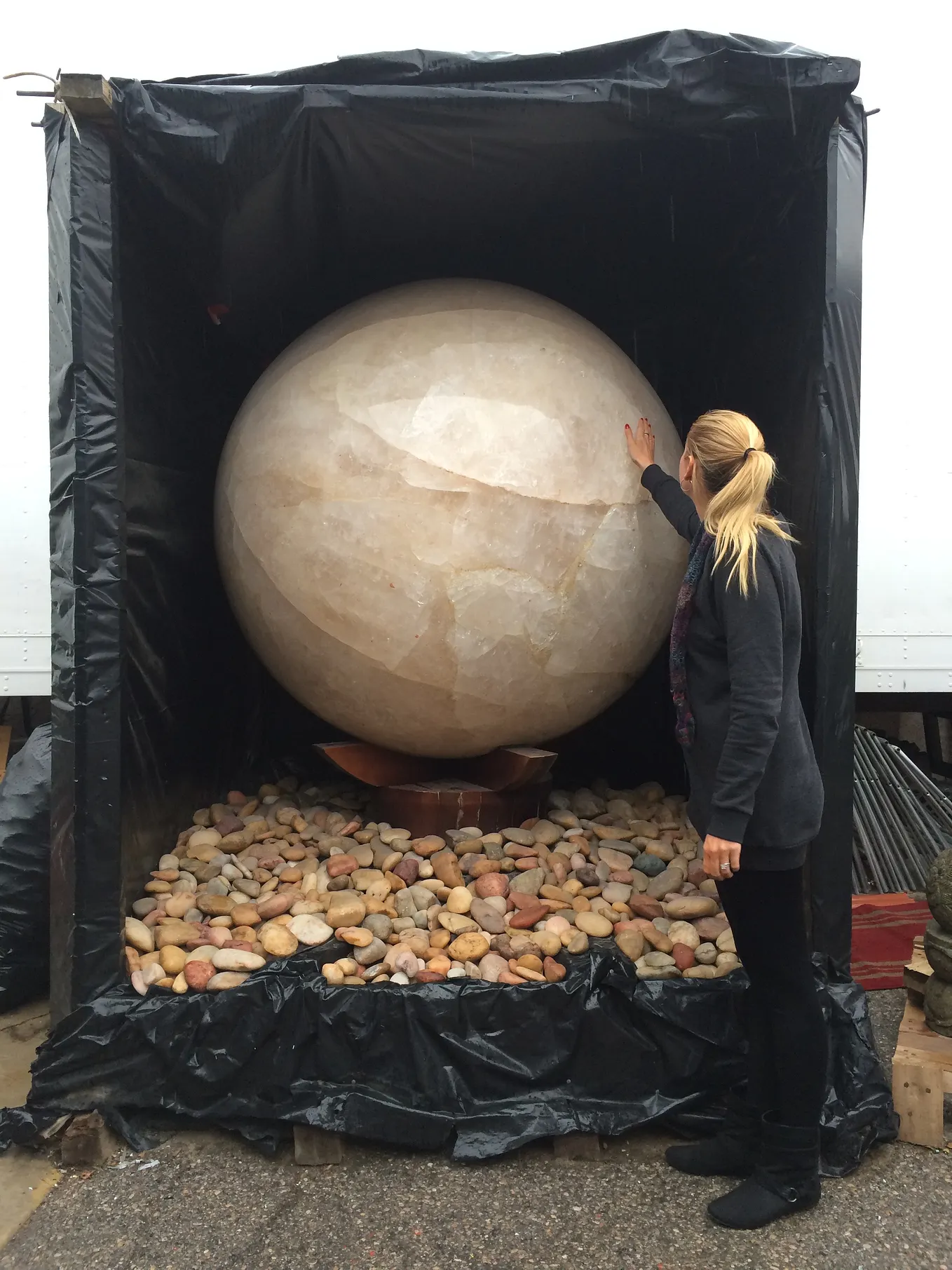 Photo of a large crystal phere 5 feet in diameter and weighs 11,500 lbs