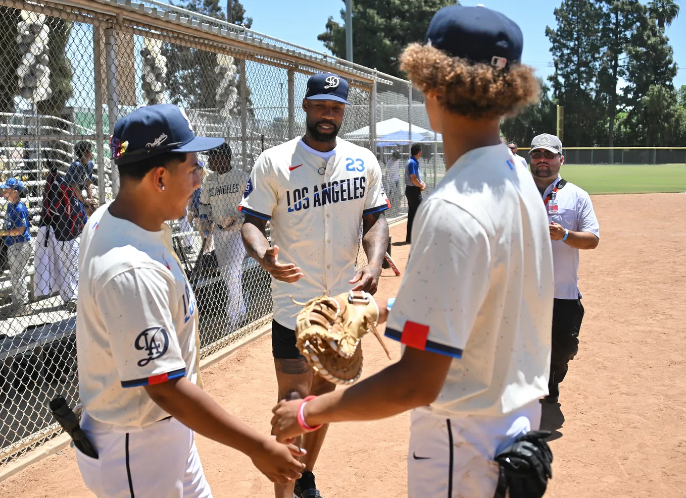 LADF’s Dodger Dreamteam, joined by players and legends, are first to take the field in Nike City…