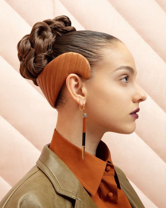 Chanel models wore messy buns on the runway