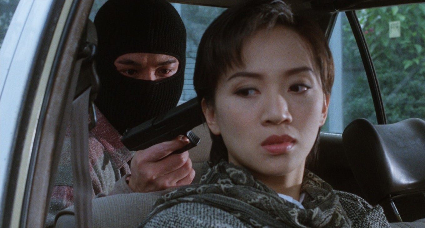 Xie Miao as Gung Gu & Jet Li as Gung Wei | Anita Mui as Detective Fong in ‘The Enforcer’ — Credit: Eureka Entertainment