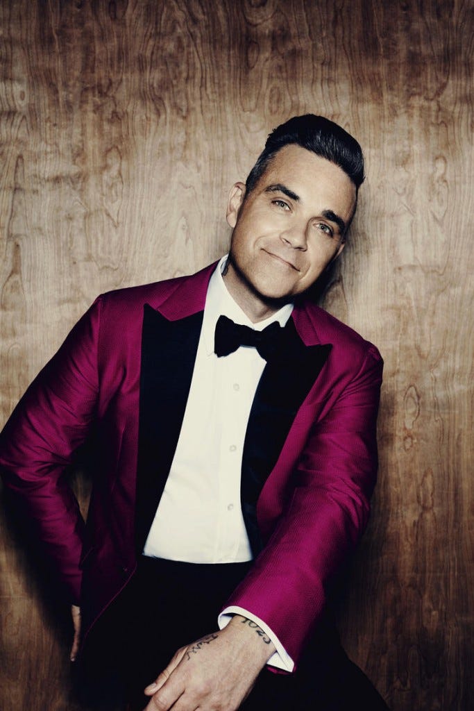 Album Review: Robbie Williams — 'The Heavy Entertainment Show' | by  Christoph Büscher | ArtMagazine | Medium