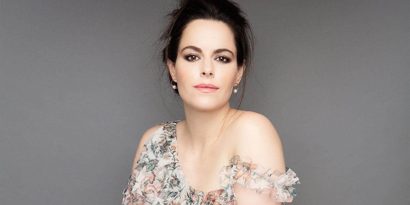 Emily Hampshire Checks Out of the Rosebud Motel and Heads Straight to the  Super Bowl | by Kim Kornfeld | Medium
