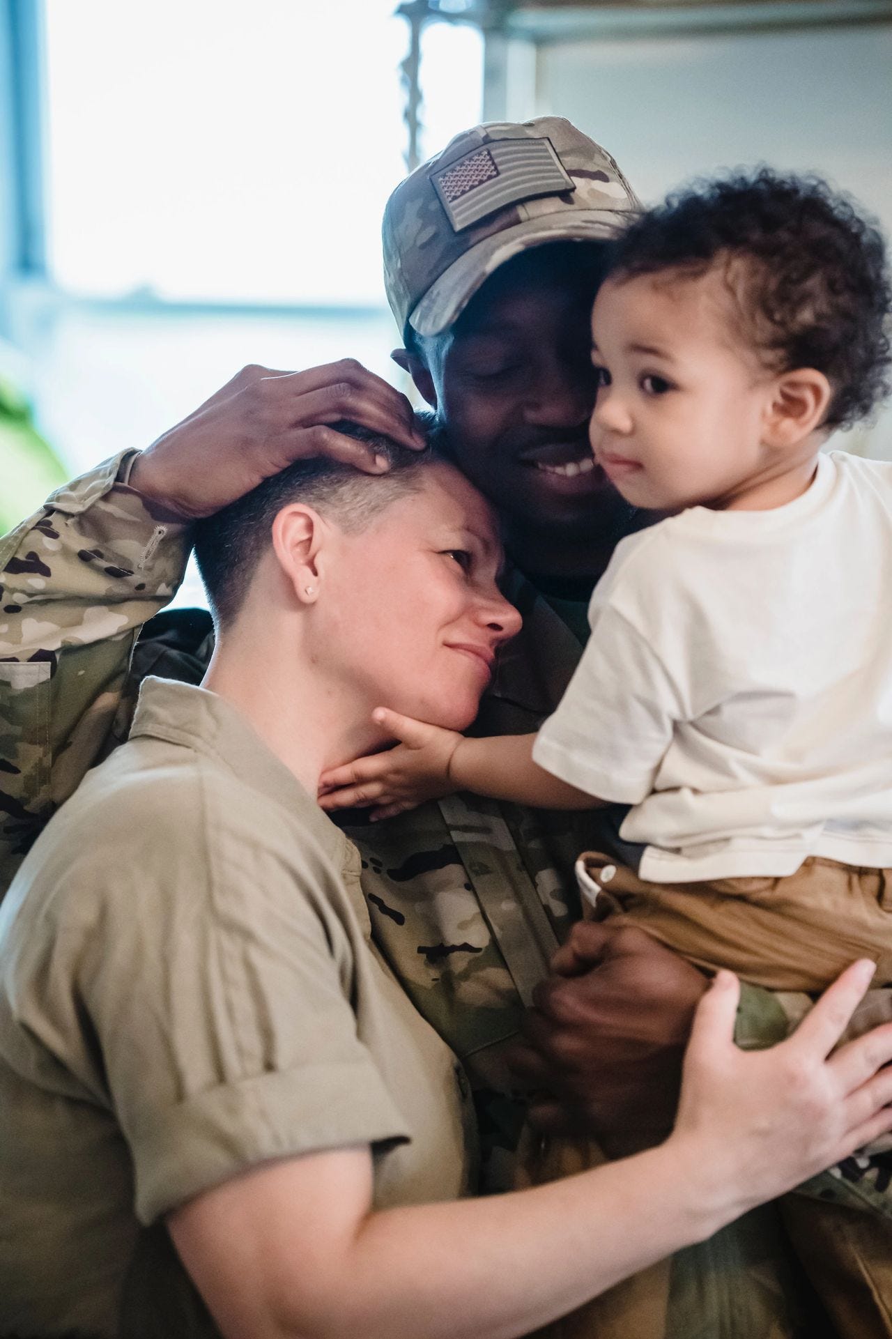 Mickey Markoff Air Sea Exec 2023 — photo of US military family, husband, child, wife on Mickey Markoff 2023 article about month of the military child