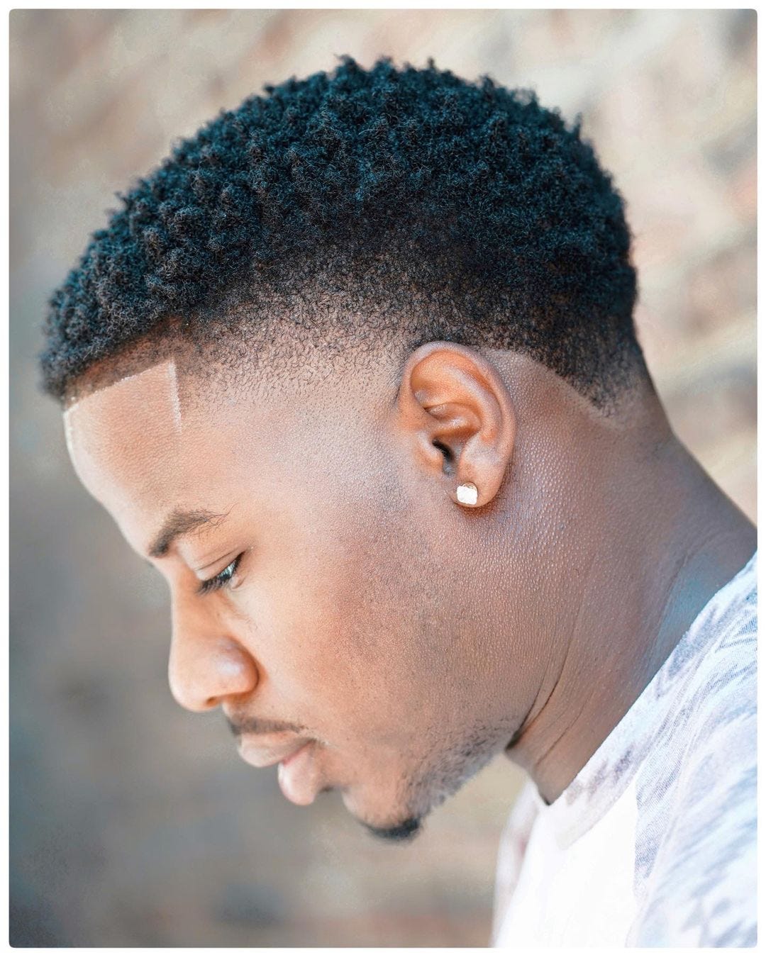 Taper fade haircuts never go out of style, they just get updated., by  Osairamofficial