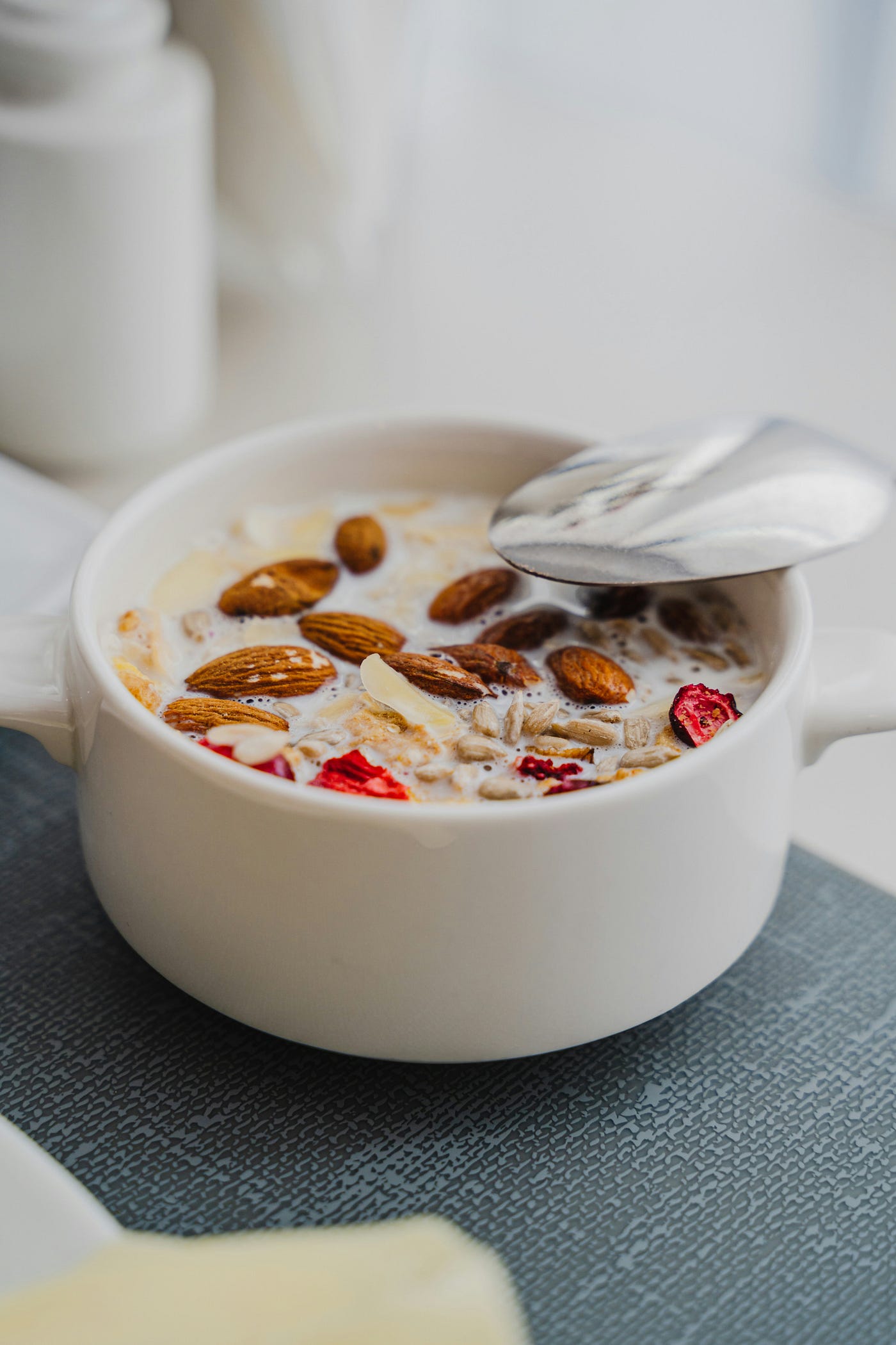 Healthy oatmeal bowl on the table at the restaurant buffet.