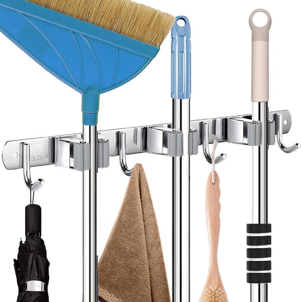 A Place for Everything: The Magic of Broom Holders 'broom holder', broom  holder, by exploreedify