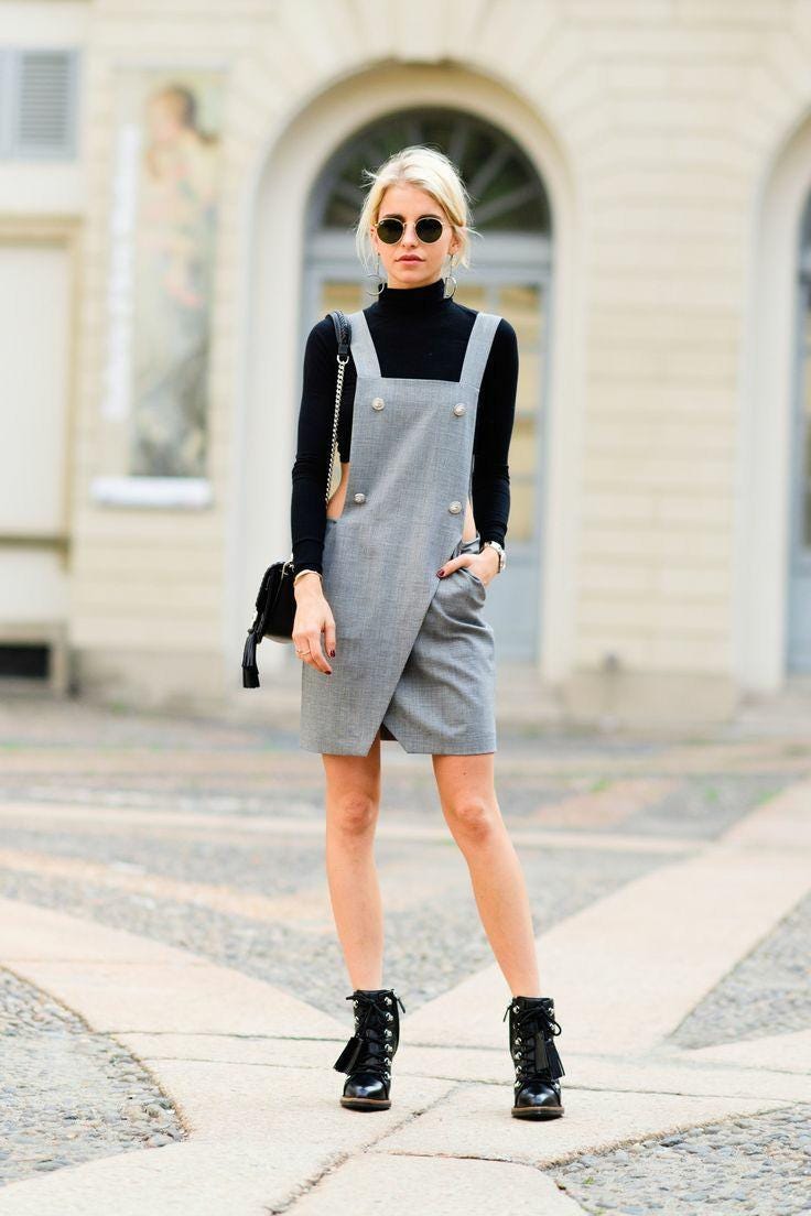 red midi dress worn with black turtleneck and accessories