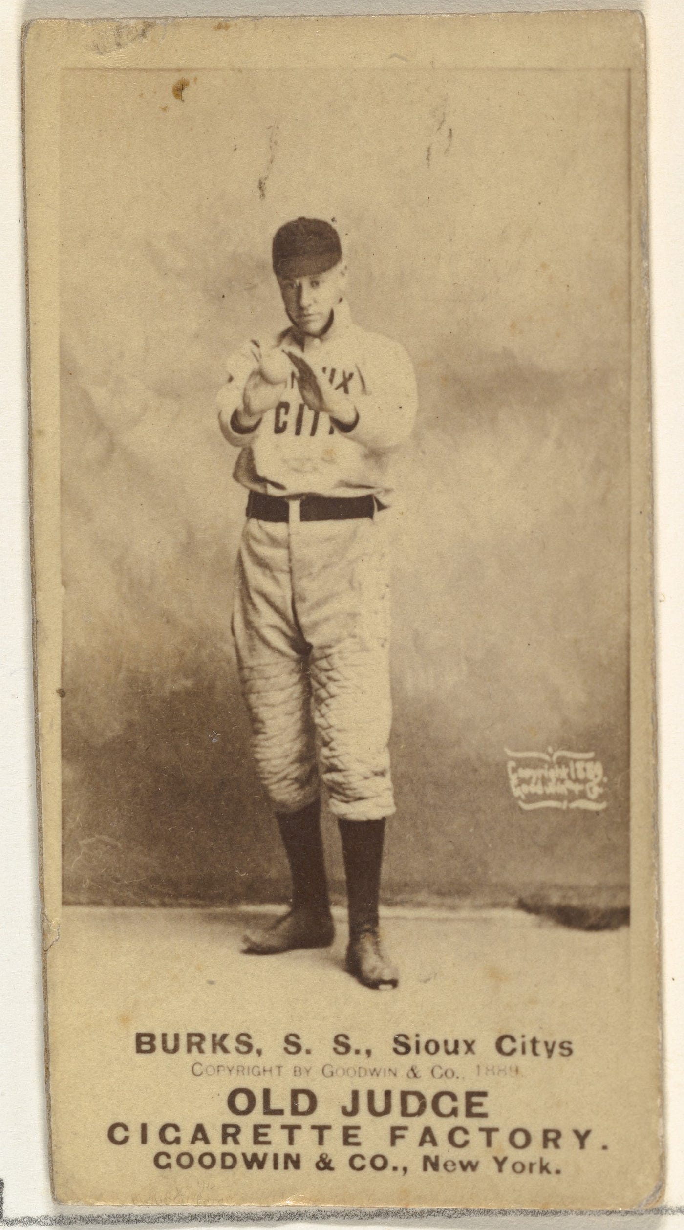 Second of three Old Judge cards for Robert E. Burks, Shortstop, Sioux City Corn Huskers