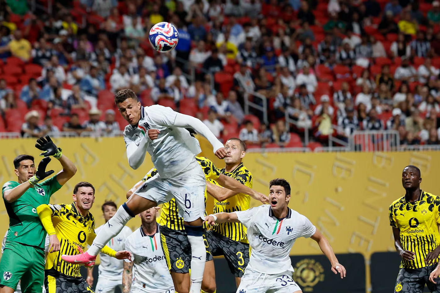 Nelson Deossa and Monterrey challenge a strong Borussia Dortmund side but fall short. Photo Credit: Atlanta Journal-Constitution.