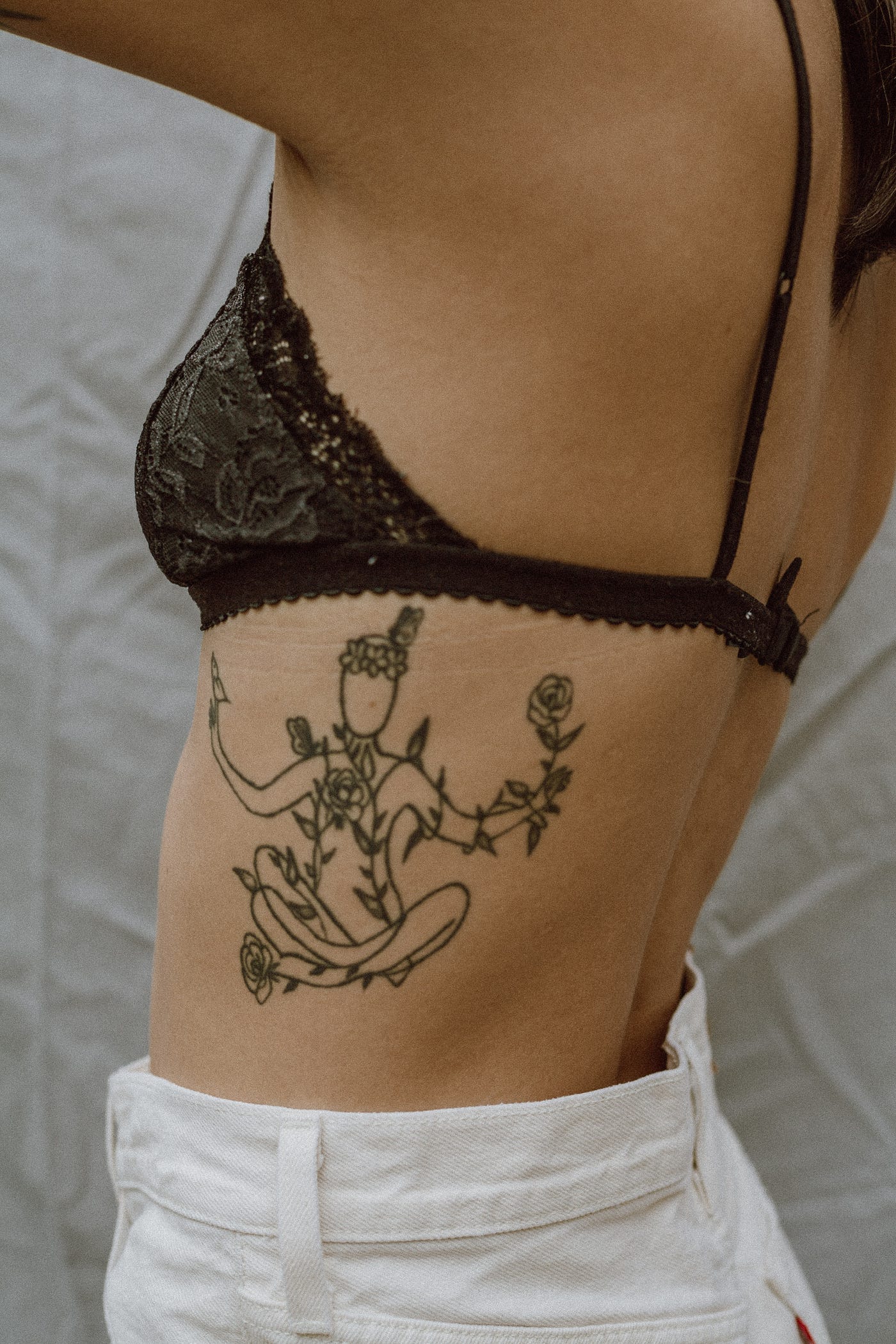 A Tattoo. The Tattoo.. Photo by Jasmin Chew on Unsplash, by Ekta Singh  Chandel