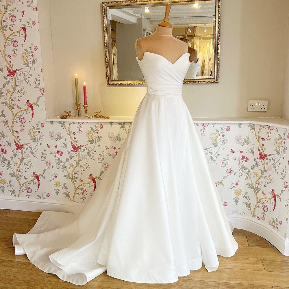 Top 8 Bridal gown + 2 Sheath dresses, by Sridevi J