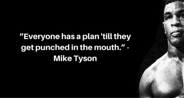 マイク・タイソンの画像と 「Everyone has a plan 'till they get punched in the mouth」（口を殴られるまで、誰にでも計画はあります）という引用