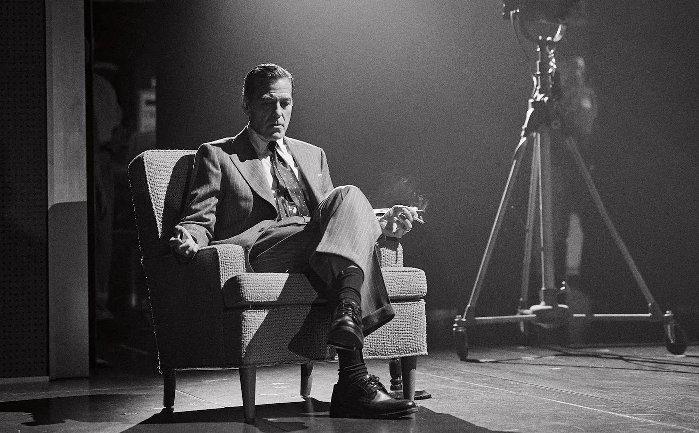 george clooney smoking cigarettes Clooney's Good Night, and Good Luck Is a Passion Project Rooted in Family Legacy George Clooney Close Up in