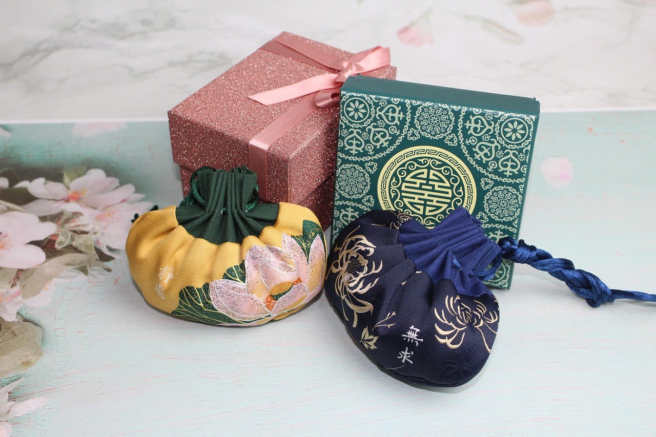 Herbal sachets filled with mugwort clove and peppermint hung to repel mosquitoes naturally