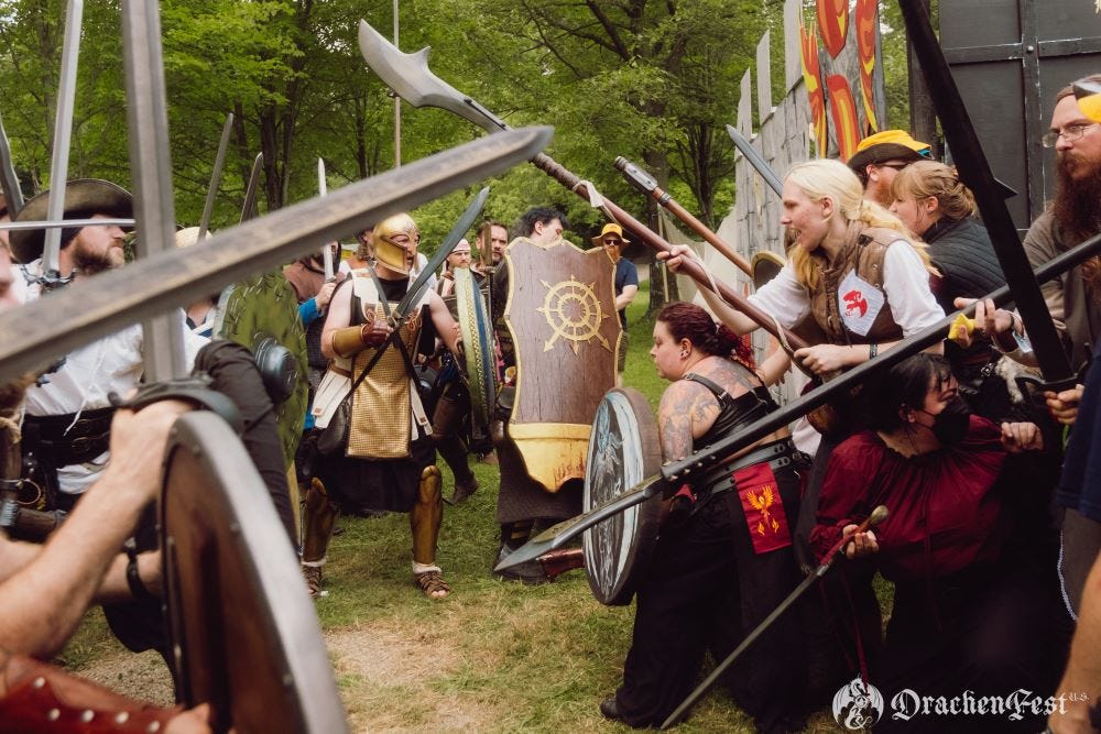 Fantasy warriors training in combat courtyard
