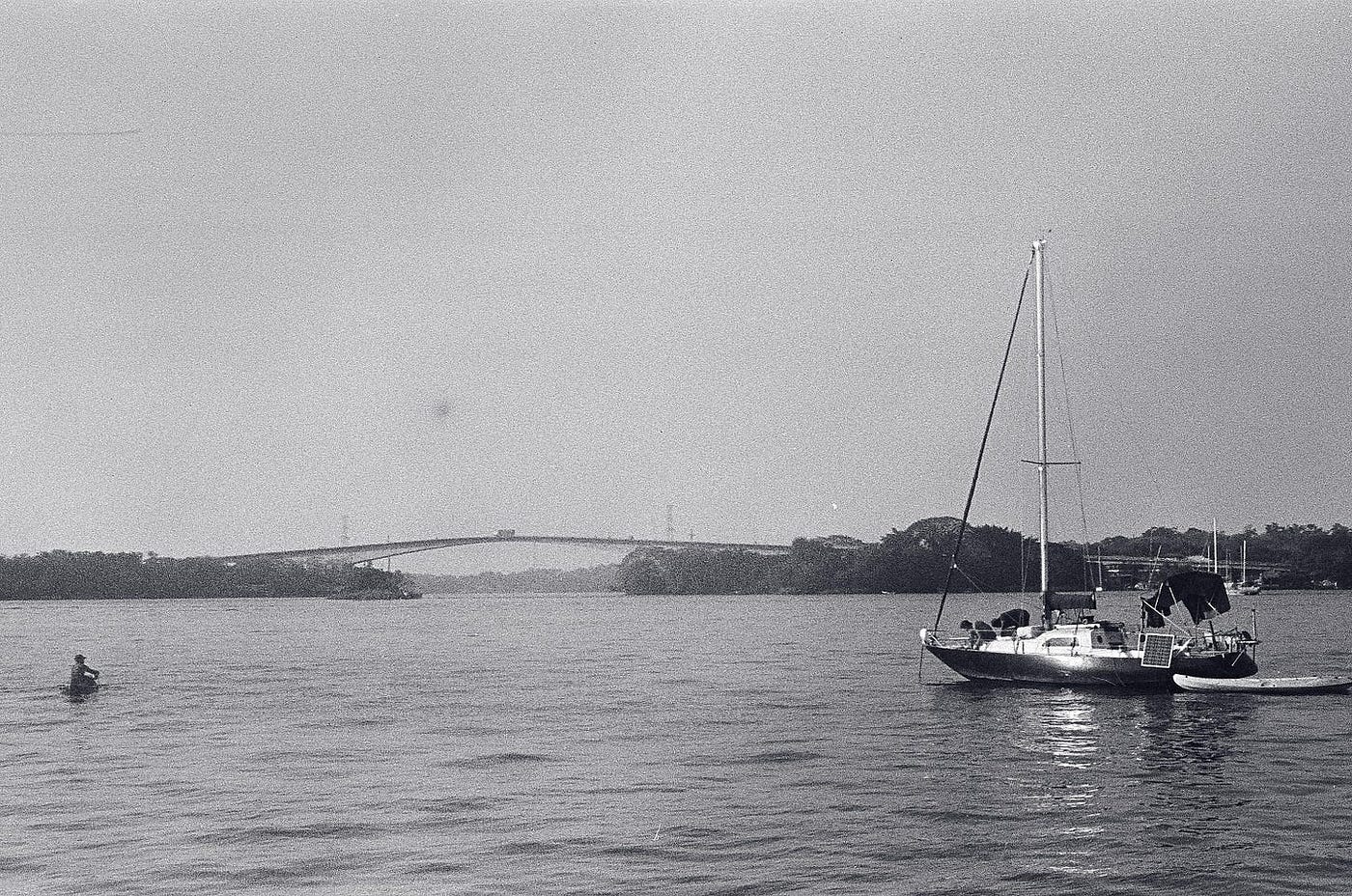 Lost in thought amidst the vastness of the water