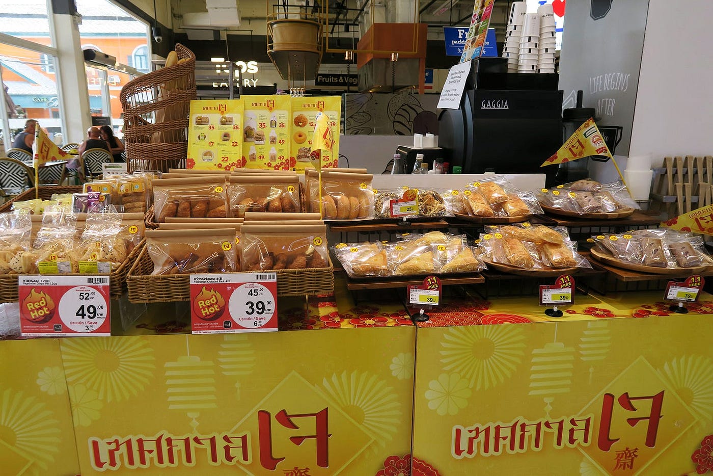 A large display of vegan baked goods at the bakery section of Tops Supermarket.