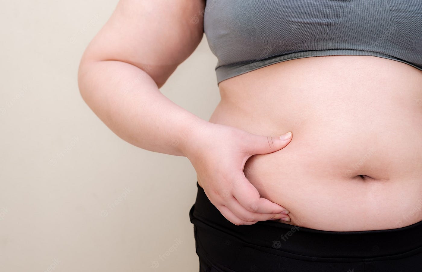 What Causes A Big Belly In Women?