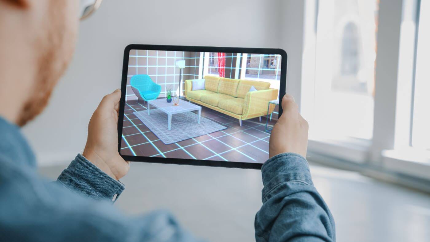 Augmented Reality furniture in an empty room, viewed on an tablet