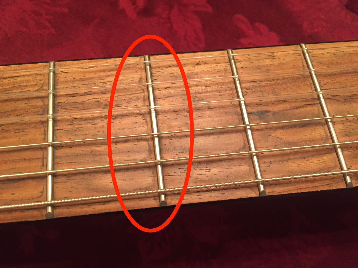 I decided to clean my guitars fretboard (rosewood). I applied some lemon  oil with a microfiber cloth and let it sit overnight. I checked on it in  the morning, and these stains