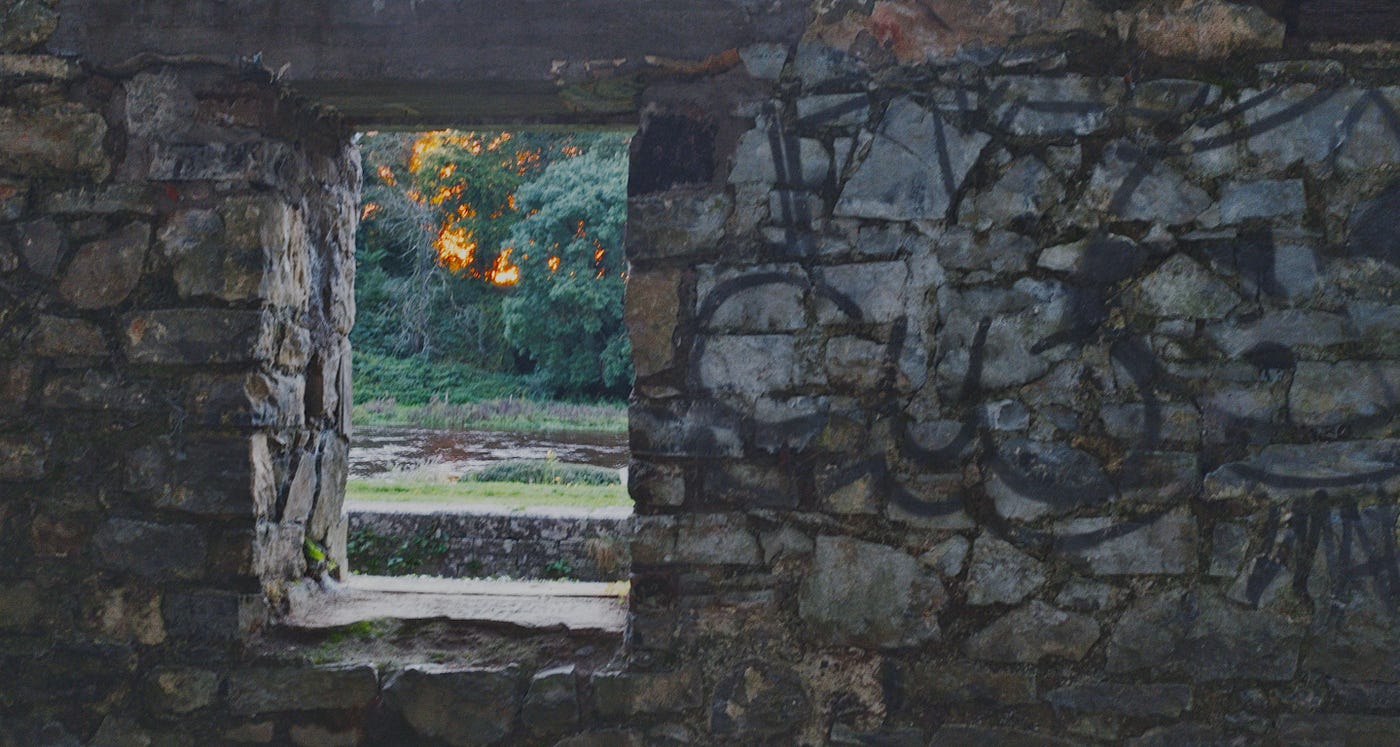 Abandoned cottage stone wall and window by Peter