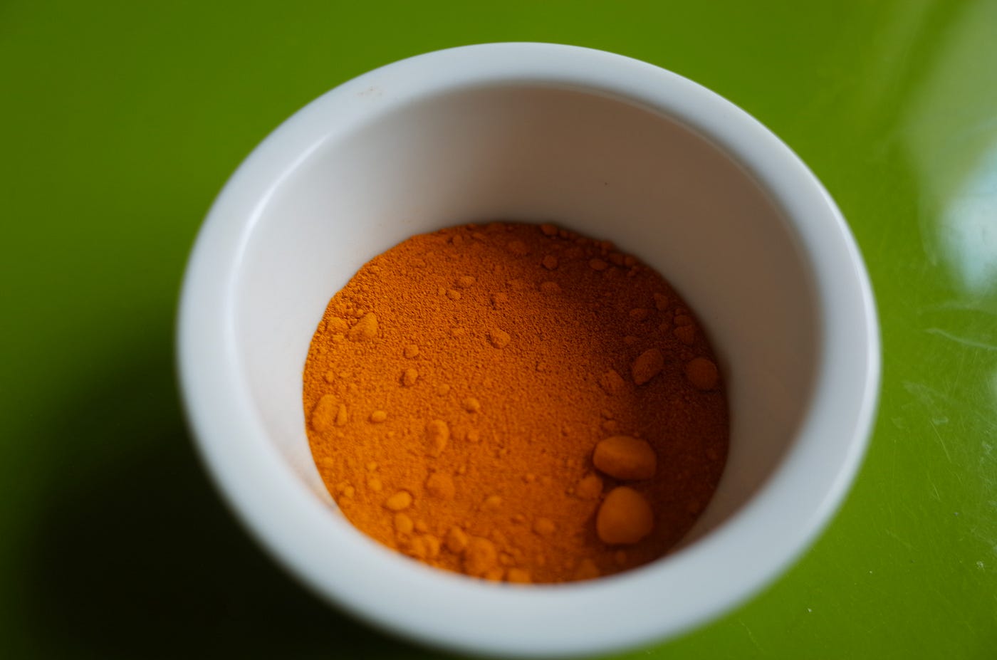 The soup broth gets its distinctive rich orange color from the blend of turmeric, paprika, and chili powder.