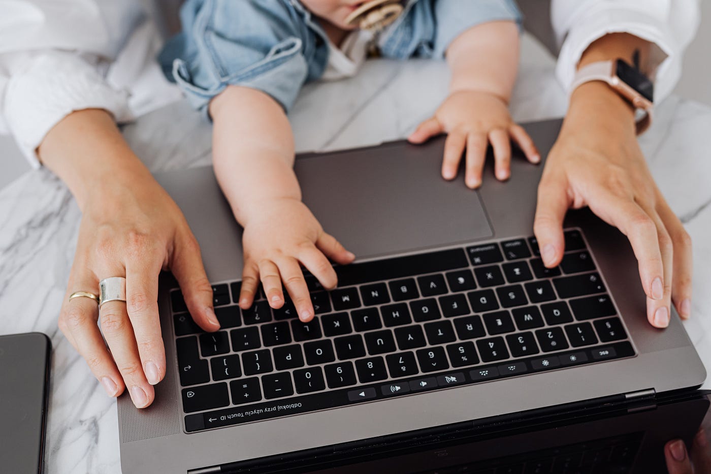 Photo by www.kaboompics.com: https://www.pexels.com/photo/a-person-using-black-and-silver-laptop-4959749/