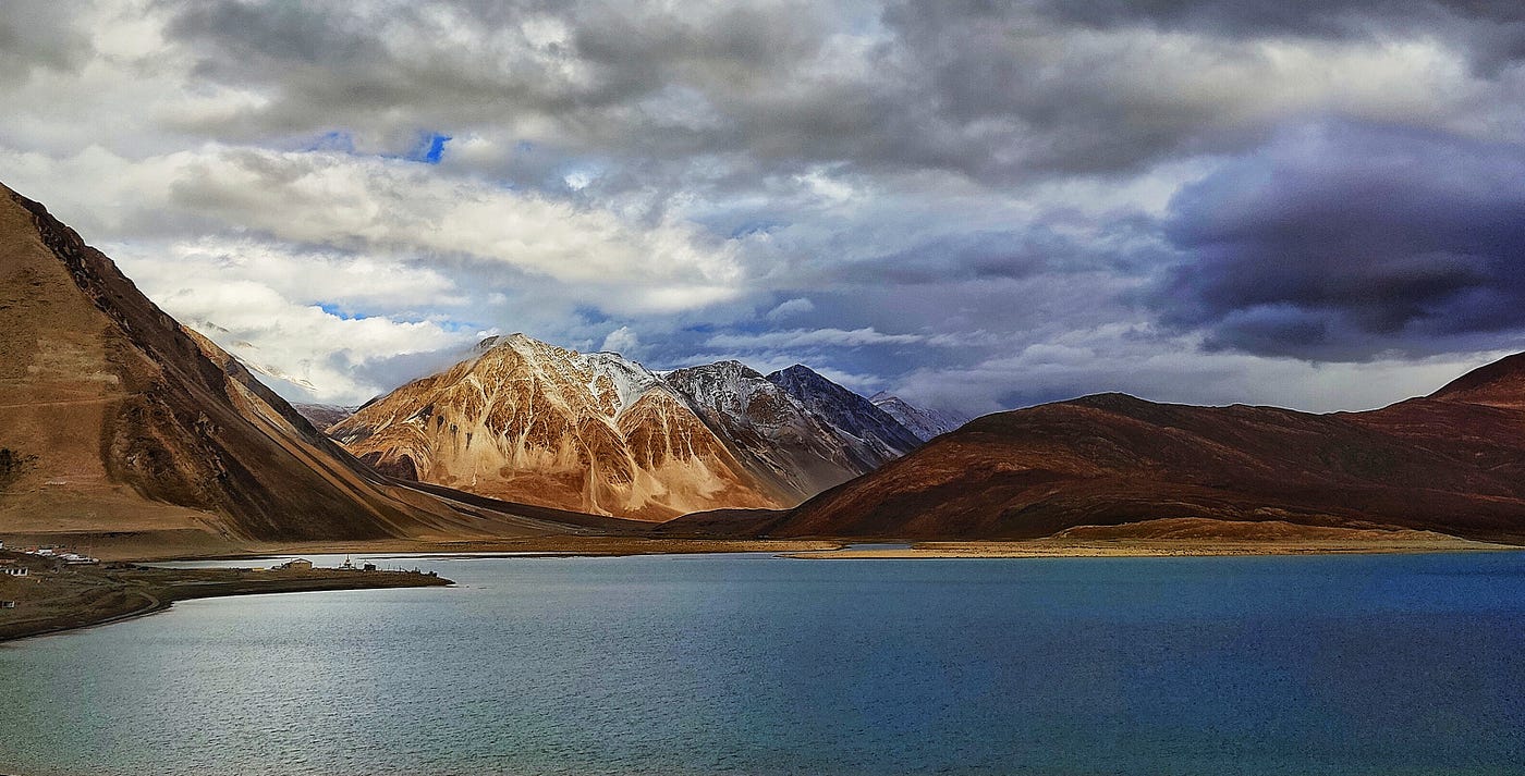 The dramatic landscapes of Ladakh unfold under ever-changing skies — a breathtaking frame captured by Arun Saha Photography.