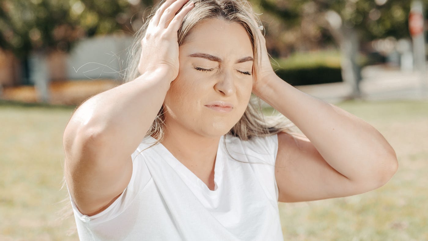 Photo by Kindel Media: https://www.pexels.com/photo/woman-in-white-v-neck-t-shirt-smiling-7298391/