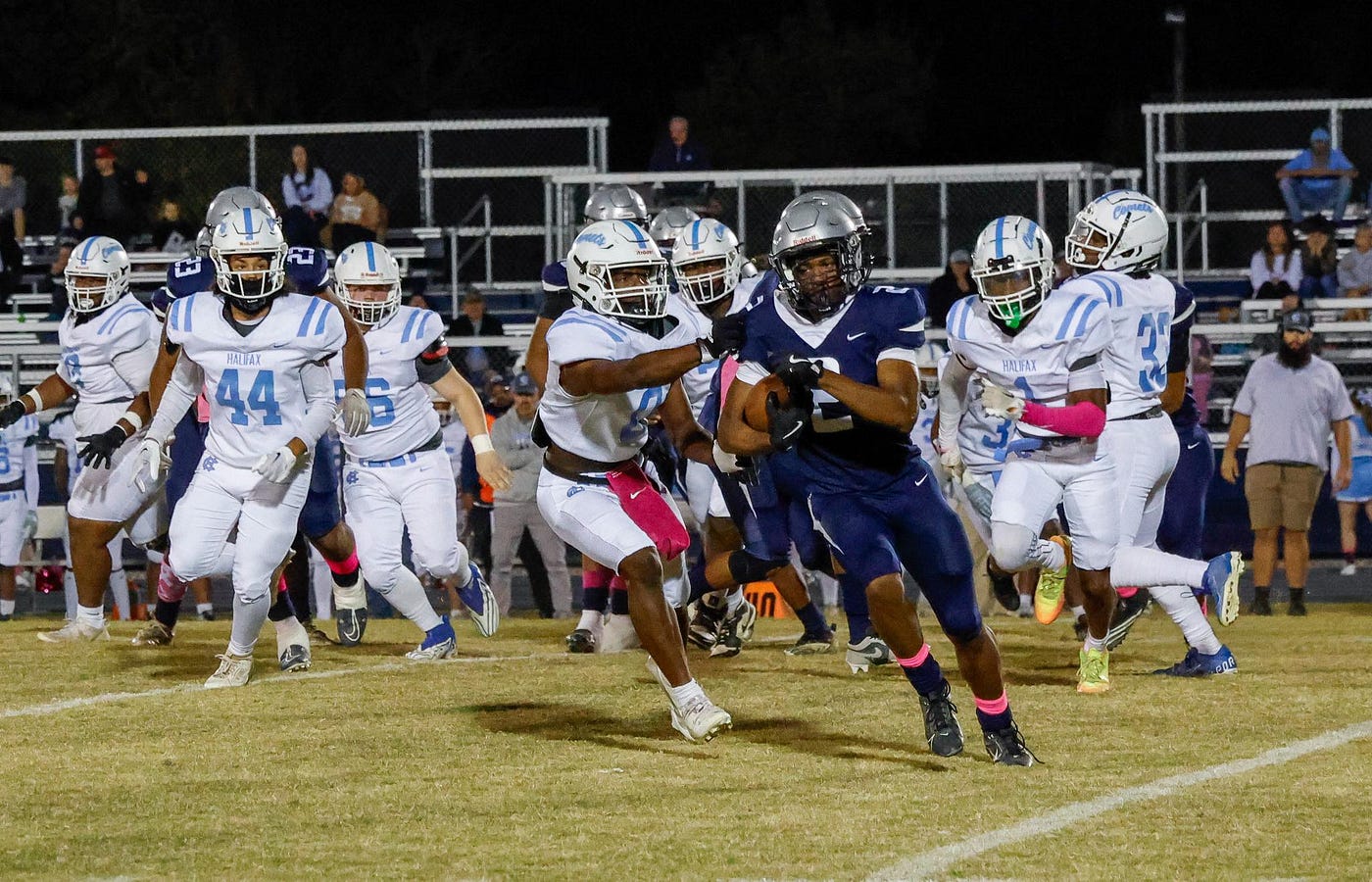 George Washington sophomore Alex Brandon (2) turns the corner for a first down against Halifax County Friday evening. PHOTO: Brian Cendejas/Special to River City Sports.
