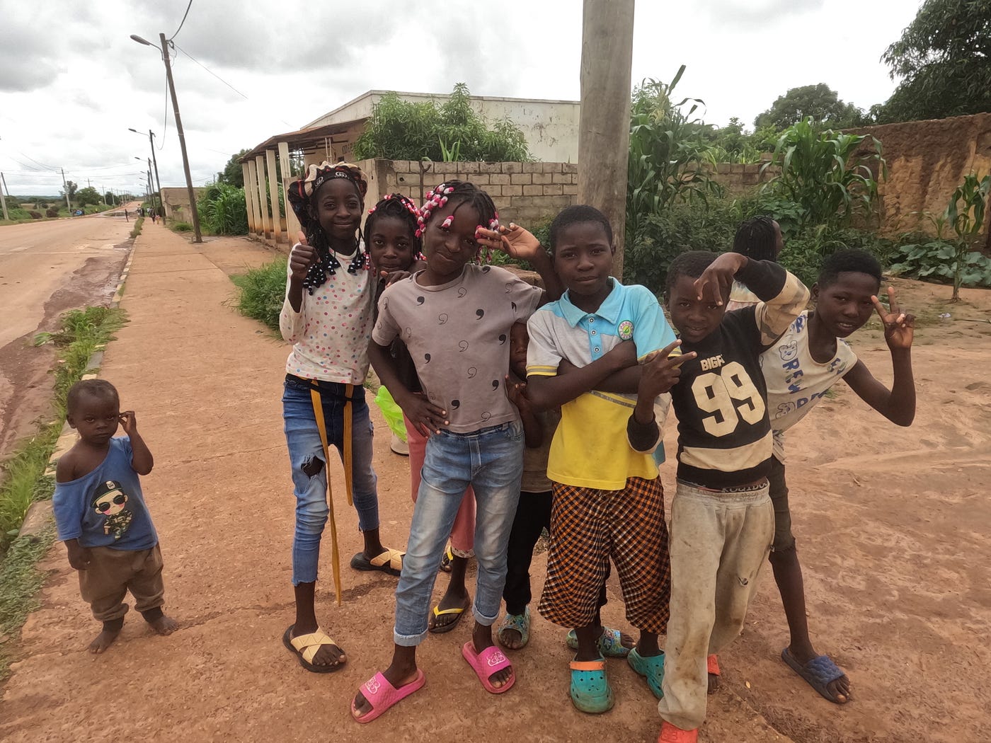The girls selling me dough balls and some of their friends posing for a picture. | Photo credit: Anne Bonfert