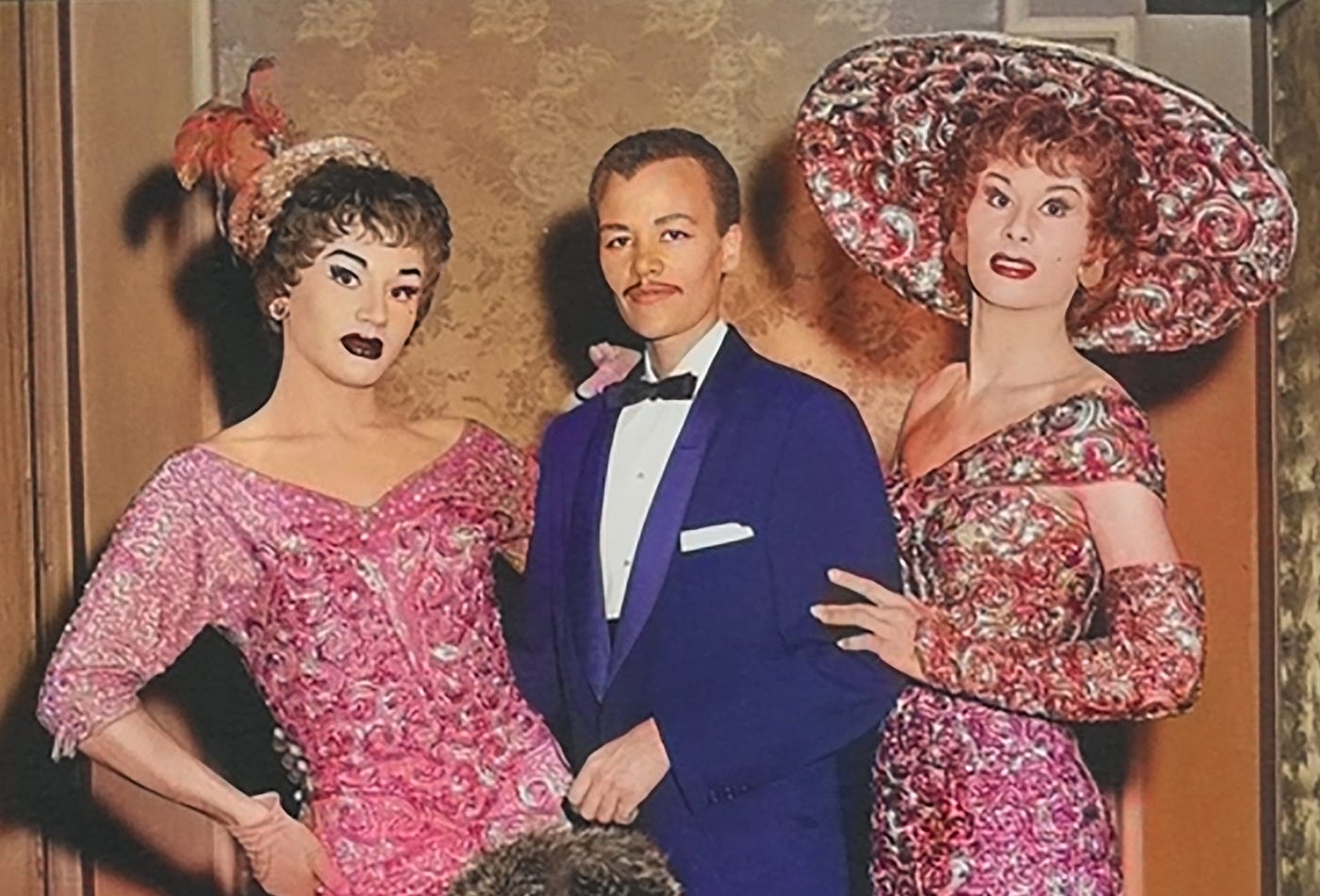 Stormé DeLarverié (center), Schomburg Digital Collections, New York Public Library, 1958, via Wikimedia Commons. Colourised by Eli Erlick, CC BY 4.0