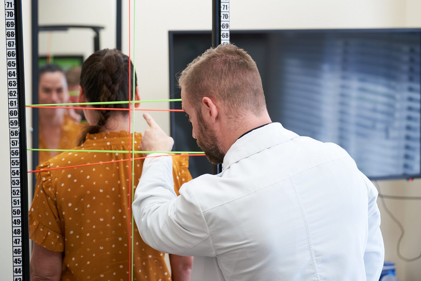 Upper Cervical Chiropractor Dr. Brett examining a patient