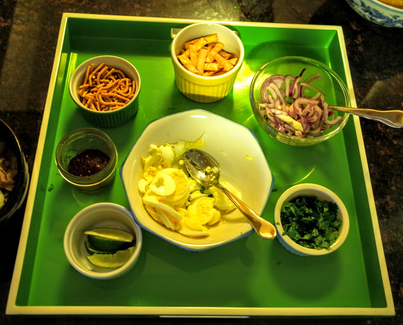 Burmese dishes are often served with a variety of garnishes table-side and each diner can add them liberally based on their preferences.