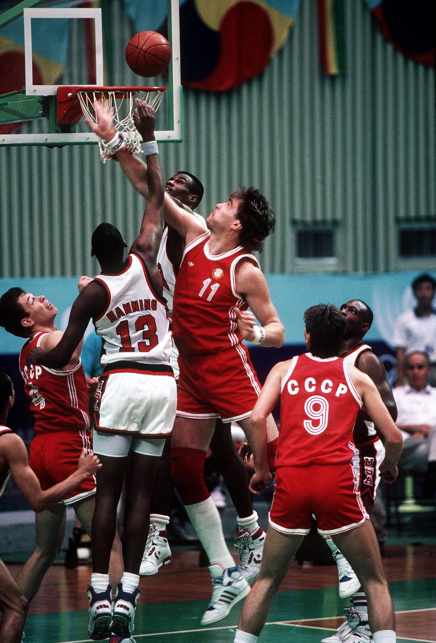 A young Arvydas Sabonis with fluid move into a pull up 3 while