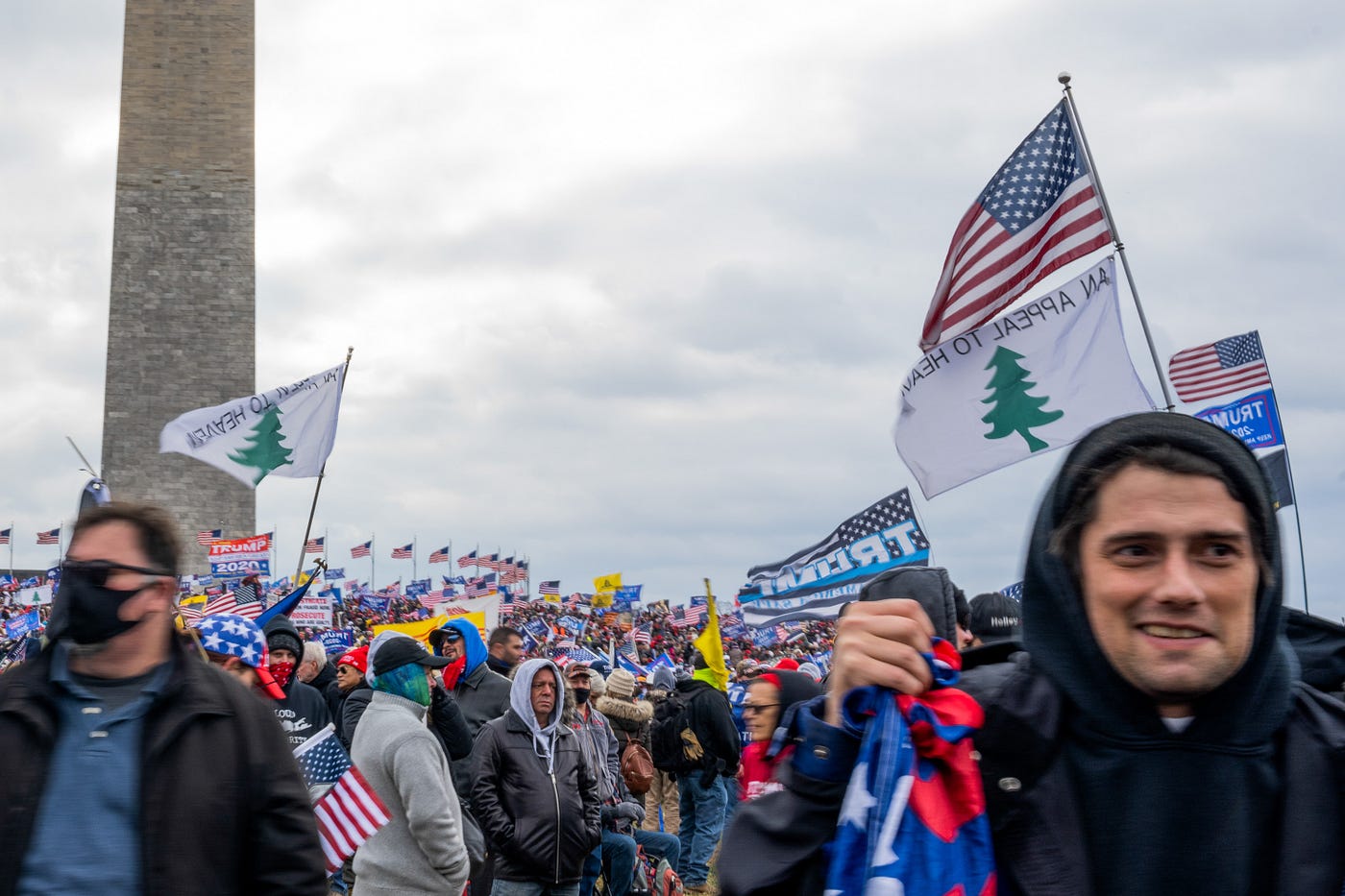 The flag: one symbol at the Capitol riot connects far-right extremism Christianity | by Tow Center | Medium