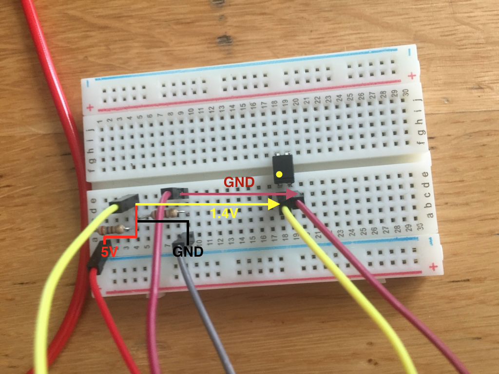 Circuit diagram showing optocoupler connected to the voltage divider