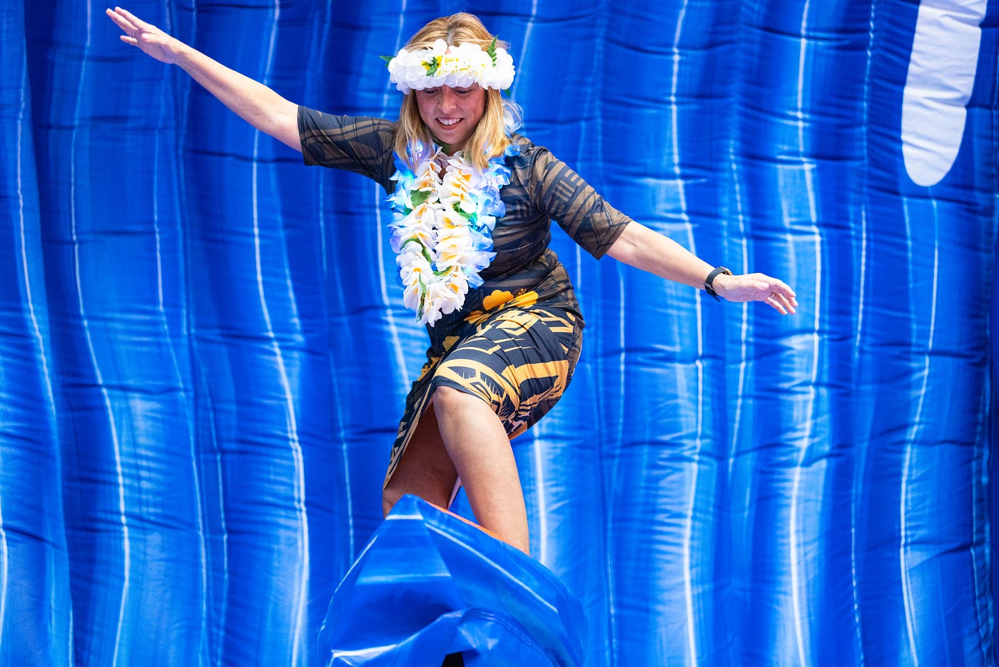 Divina Gonzalez on surfing simulator