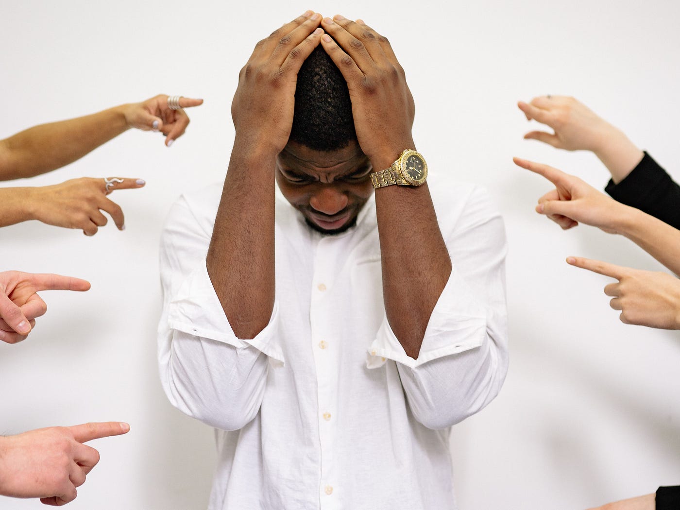 Photo by Yan Krukau: https://www.pexels.com/photo/people-pointing-fingers-at-a-stressed-man-7640495/