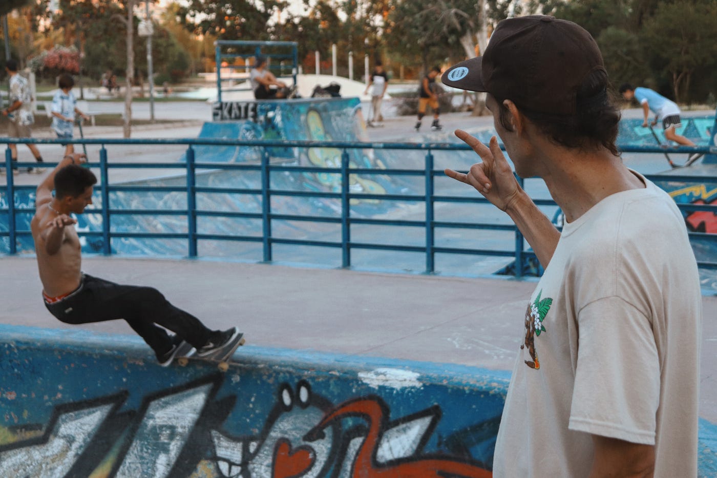 Philippe Foucart shows support to Adrian Puchades (left), 20, skating in the bowl at Skatepark Gulliver in Valencia, Spain in June.