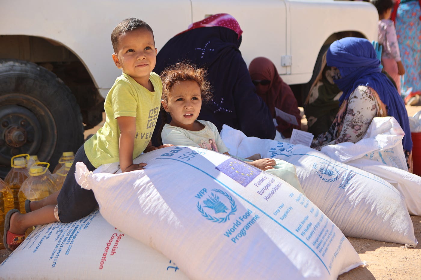 Children waiting for their mother at the food distribution point. ©WFP/Algeria