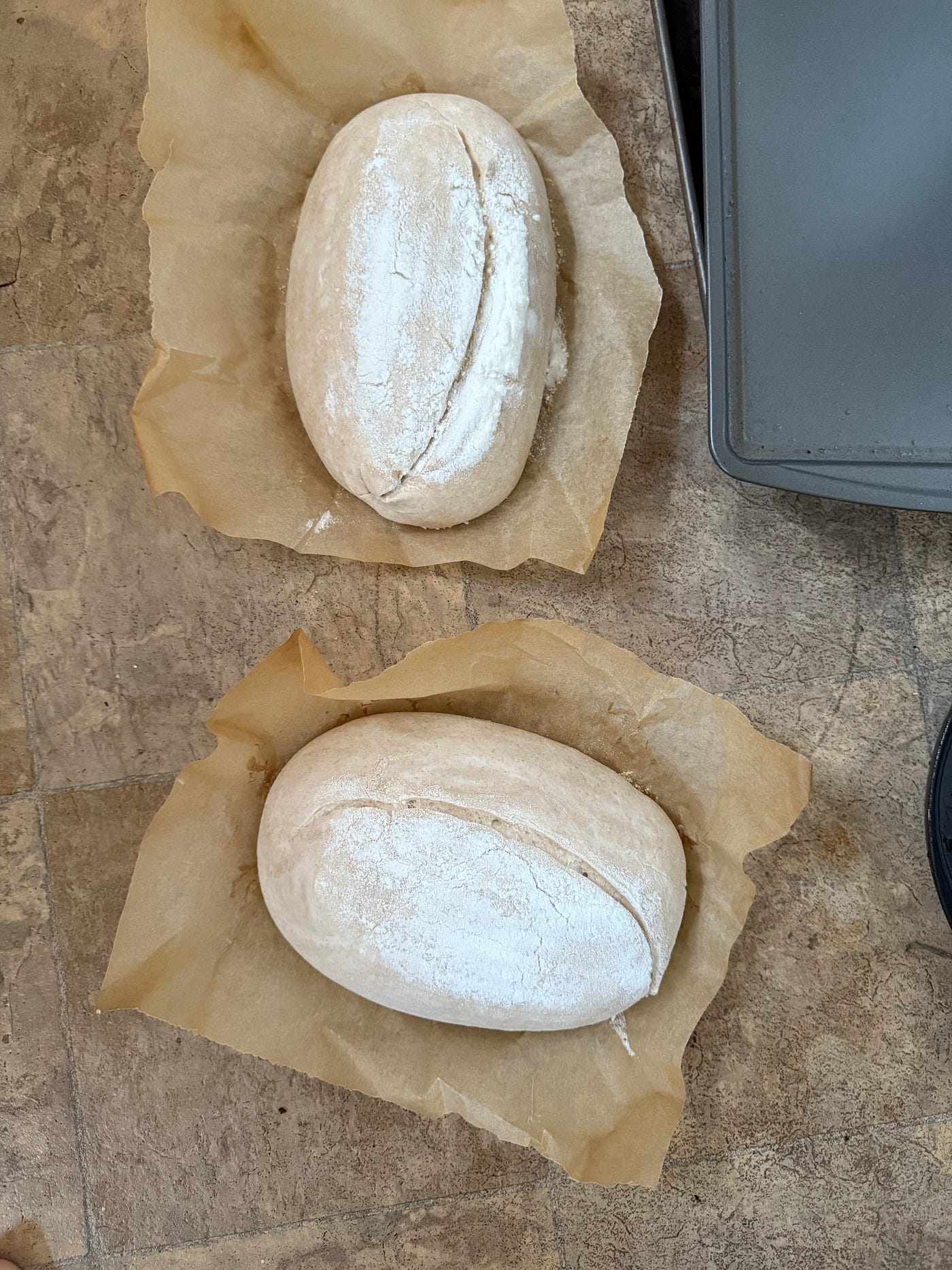 Easing proofed dough onto parchment paper (L/M), loaves after slashing with a lame (R)