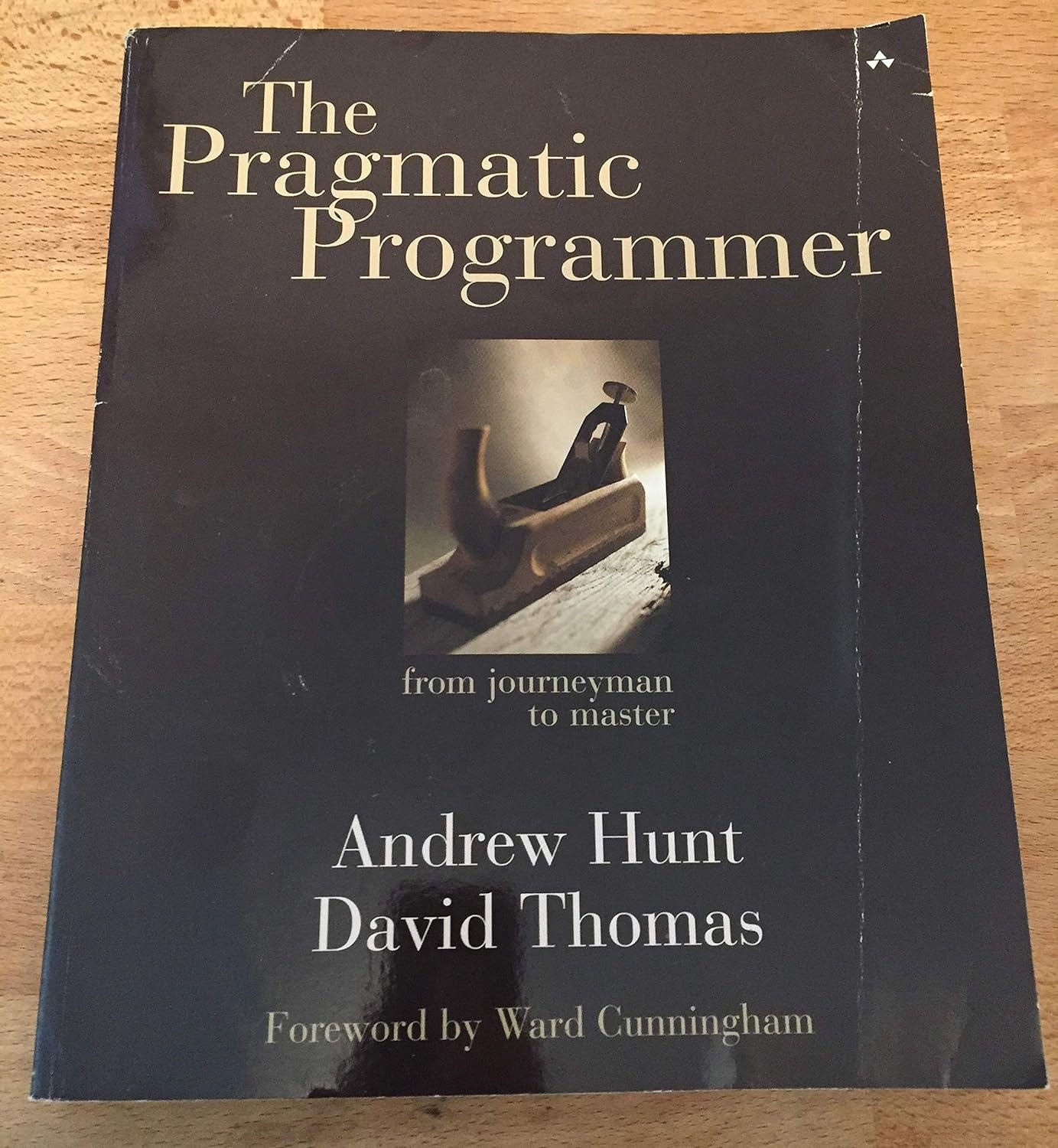 Cover of The Pragmatic Programmer: From Journeyman to Master by Andrew Hunt and David Thomas.