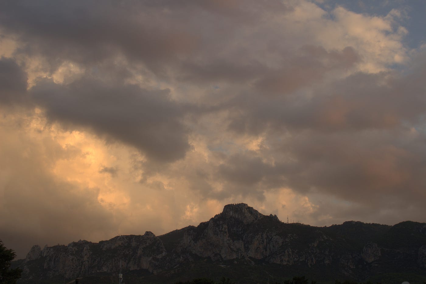 St Hilarion Mountain at sunset. The two small pointed mountains on the right are pinnacles that have separated from the larger mountain (photo by author)