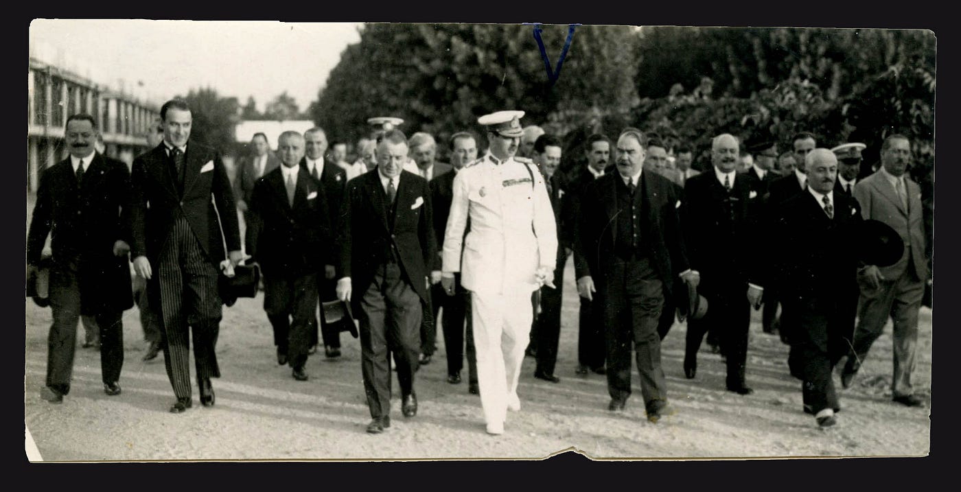 King Carol II at opening of Strandul Kiseleff (1929). Iuliu Iancu is seen behind his left shoulder.