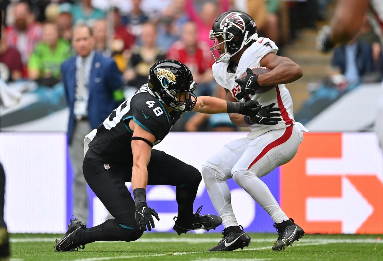 Oluokun's last-minute pick saves Falcons' win over Lions